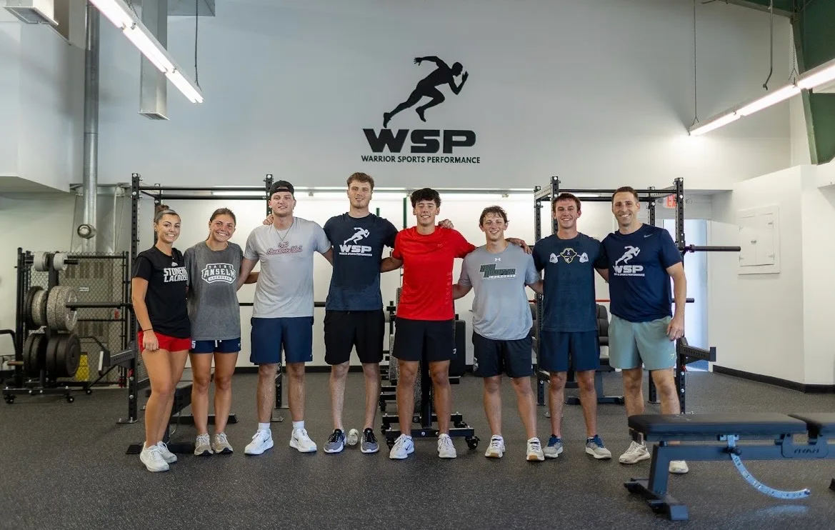 Warrior Sports Performance athletes and coach at the gym