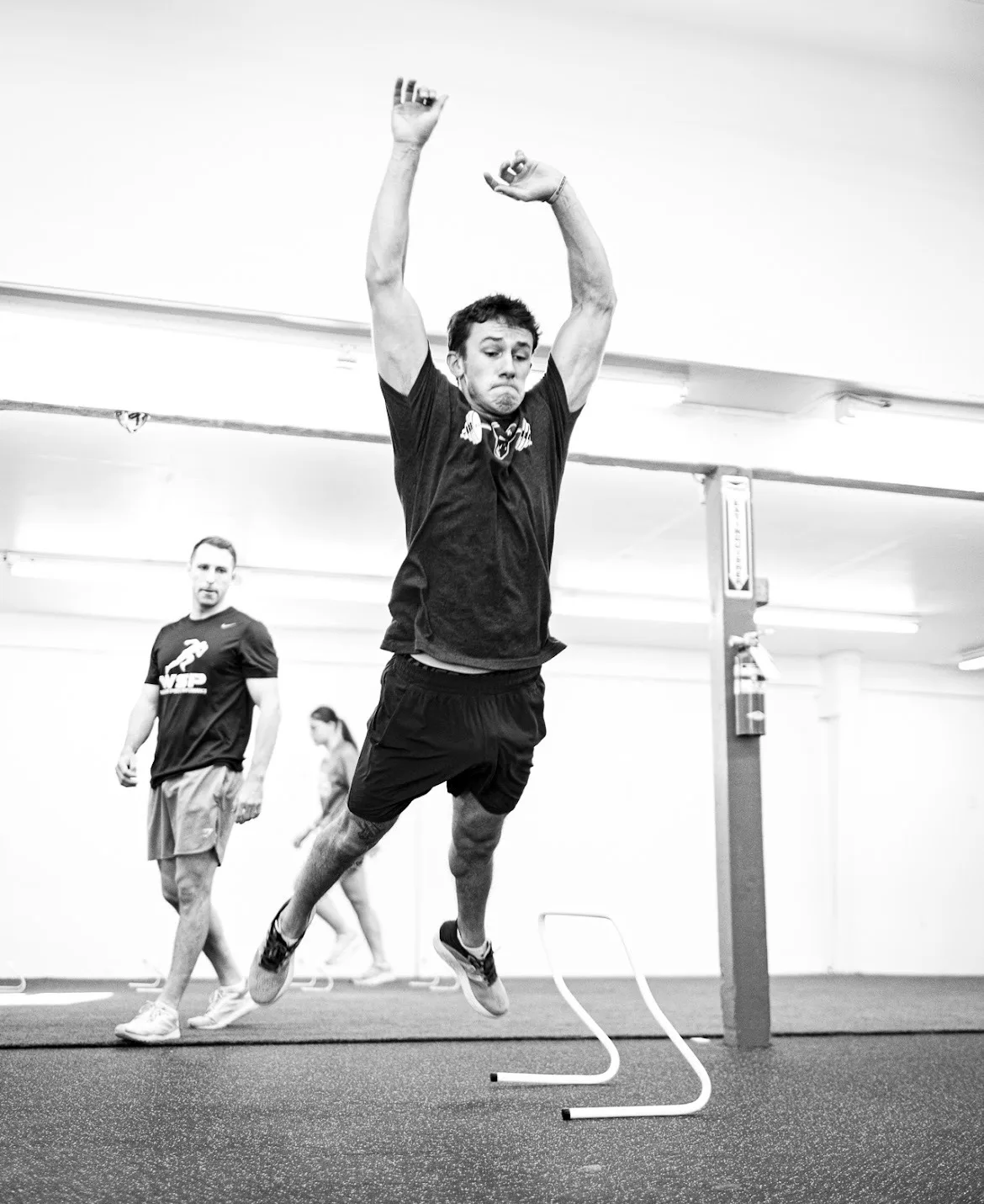 Athlete practicing a broad jump
