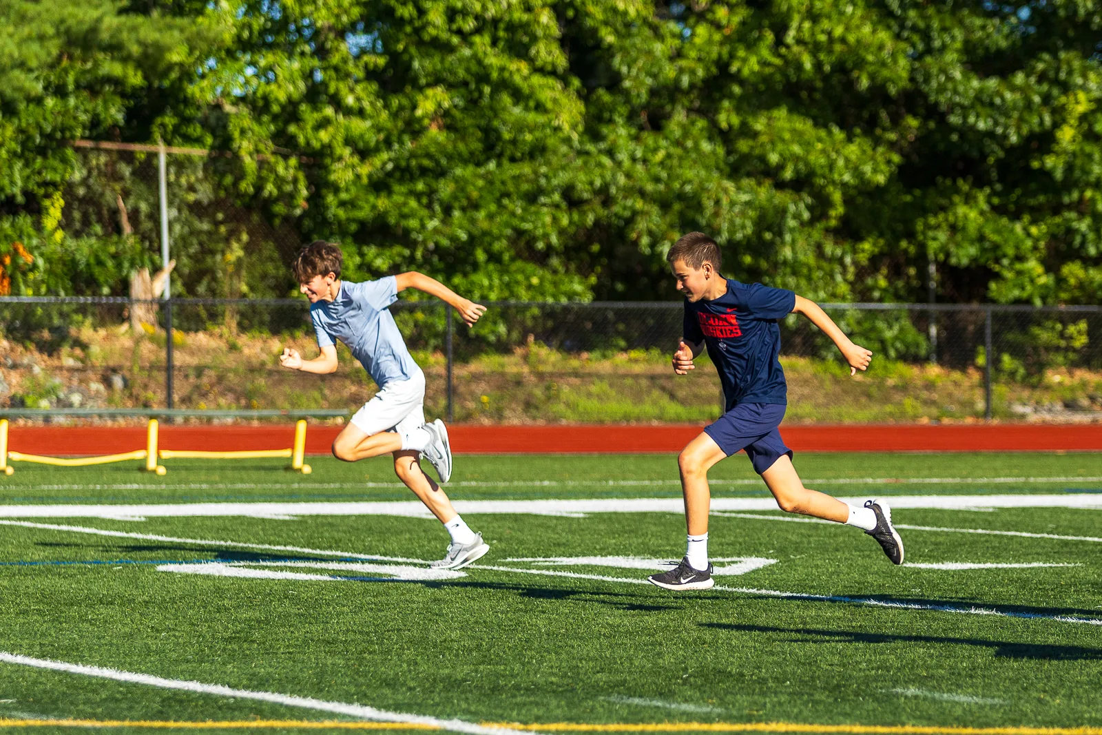 Athletes running on the field