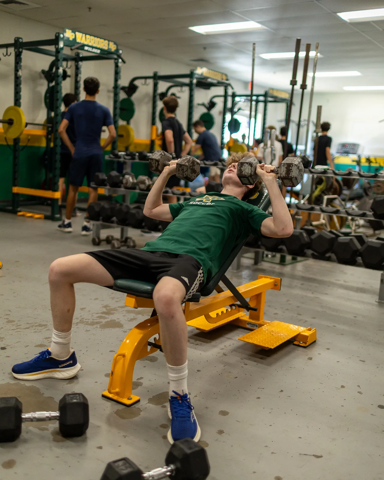 Athlete training on the incline bench