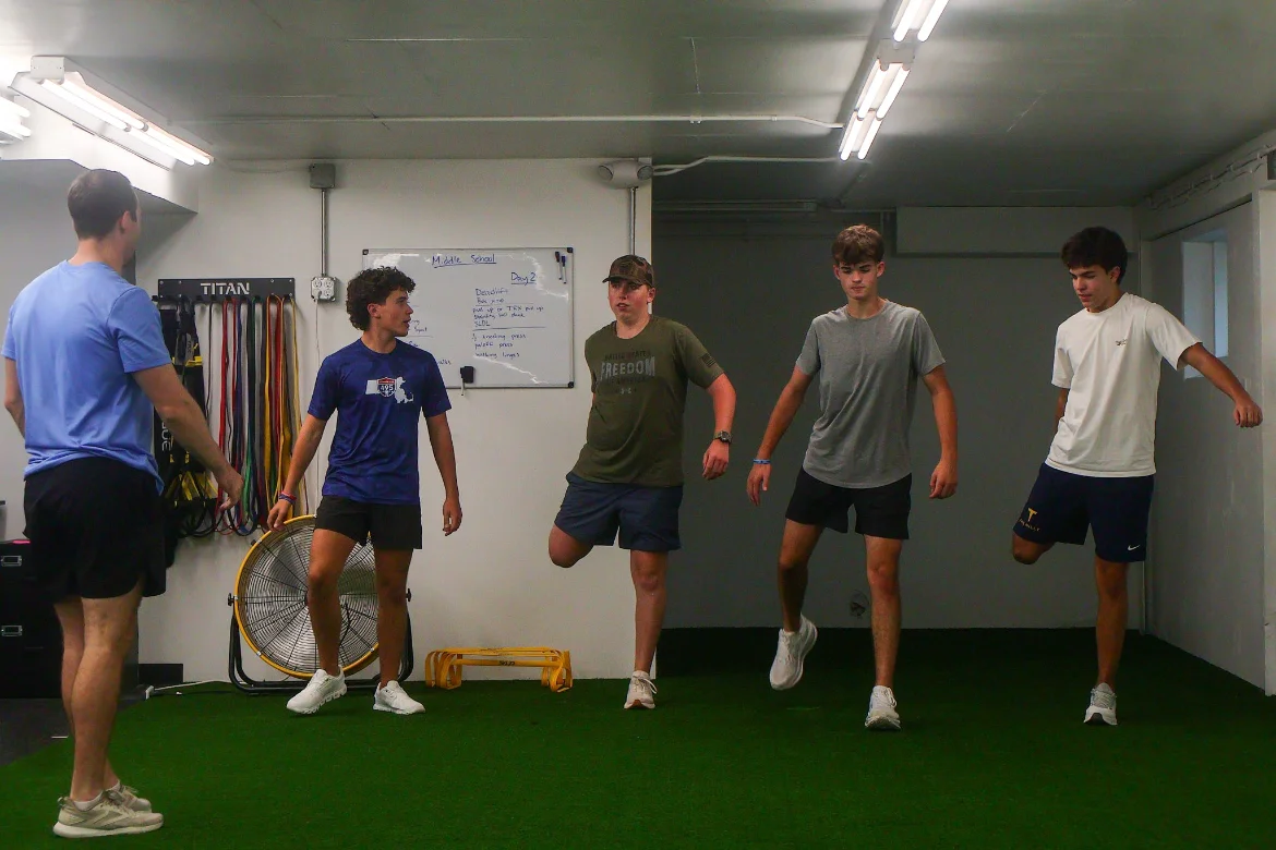 Coach leading a group warm-up at WSP